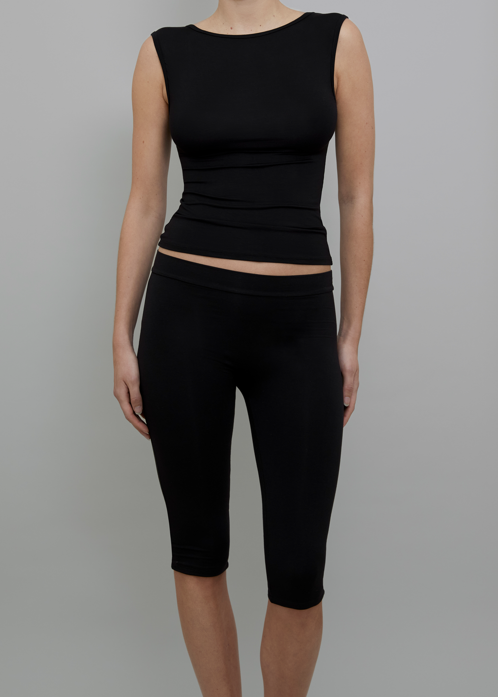 Front View of Recline Bateau Sleeveless Top in Black from KYE Intimates in Los Angeles.