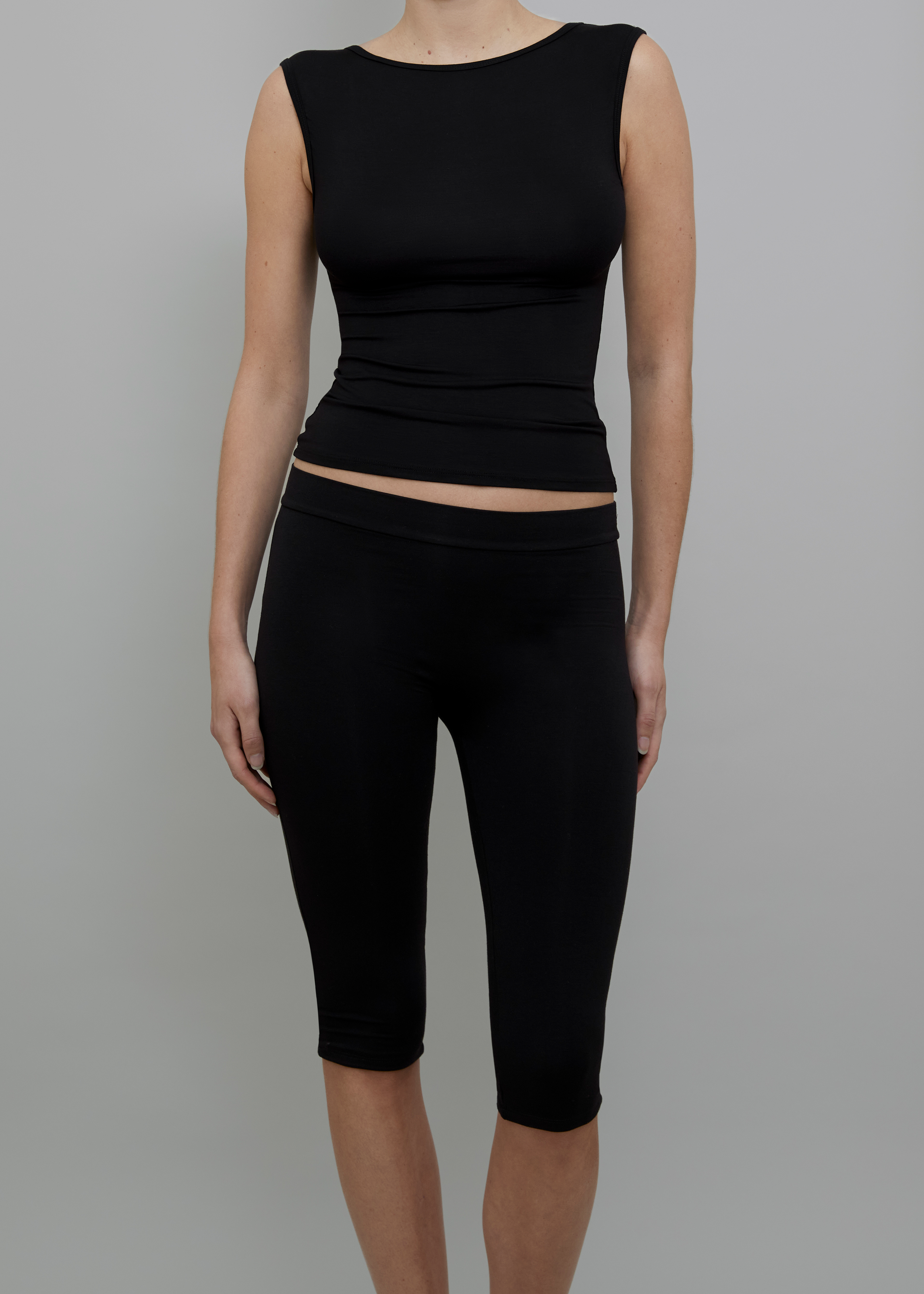 Front View of Recline Bateau Sleeveless Top in Black from KYE Intimates in Los Angeles.