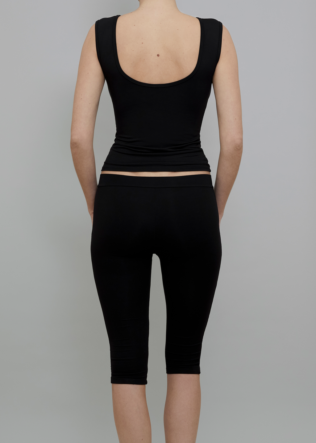 Back View of Recline Bateau Sleeveless Top in Black from KYE Intimates in Los Angeles.