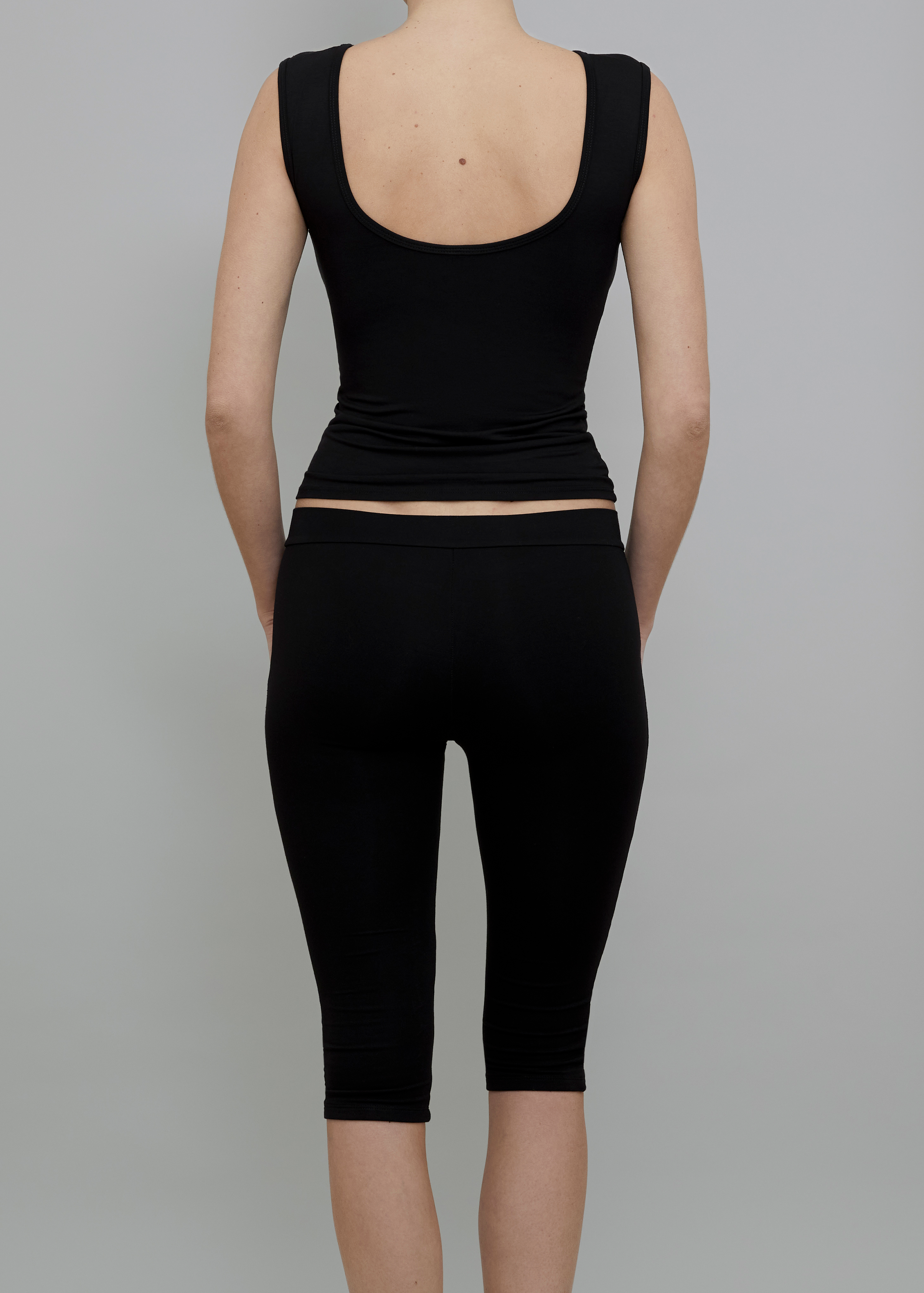 Back View of Recline Bateau Sleeveless Top in Black from KYE Intimates in Los Angeles.